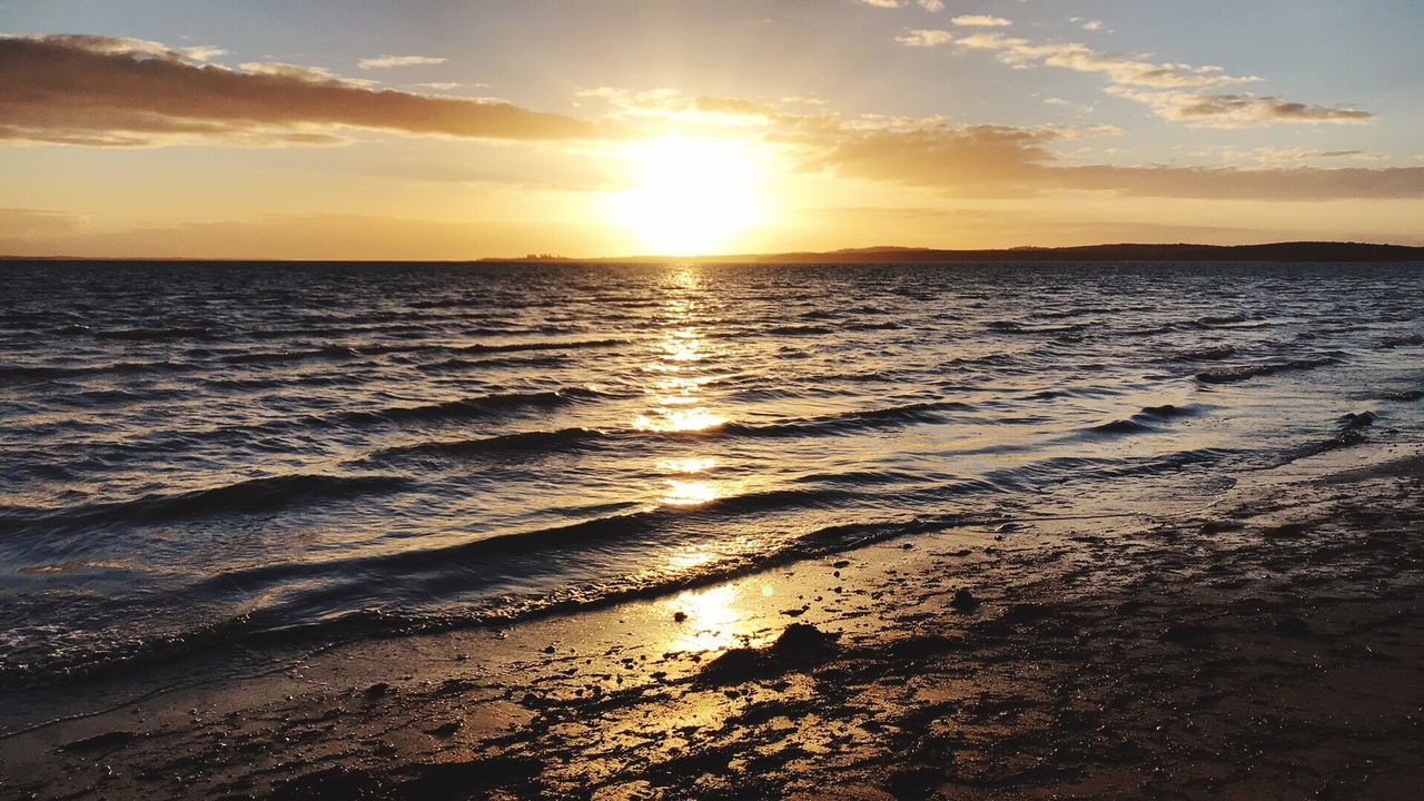 sunset, sky, water, sea, beauty in nature, beach, land, scenics - nature, tranquility, wave, orange color, cloud - sky, nature, sun, tranquil scene, idyllic, sunlight, horizon, horizon over water, no people, outdoors, bright