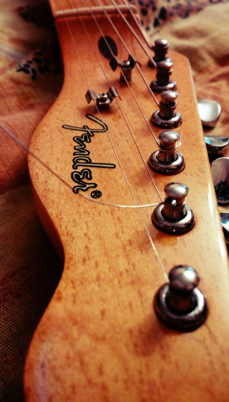 CLOSE-UP OF GUITAR