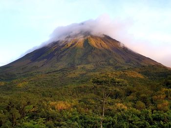 View of volcanic landscape against sky