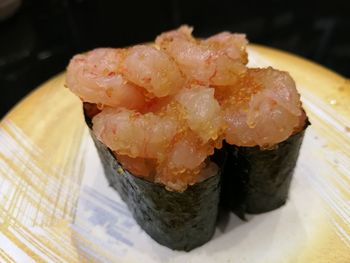 Close-up of sushi served on table