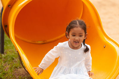 Portrait of smiling girl in playground