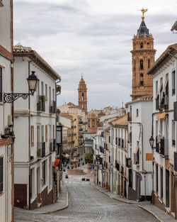 A picturesque narrow of a white downtown antequera in andalusia, spain