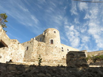 Low angle view of old ruin building