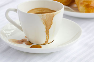 Close-up of coffee in cup on table