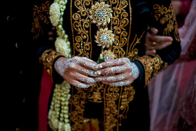 Close-up of bride in wedding dress 