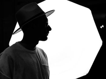 Portrait of young man wearing hat
