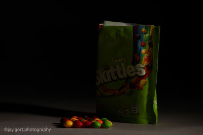 Close-up of multi colored balls on table