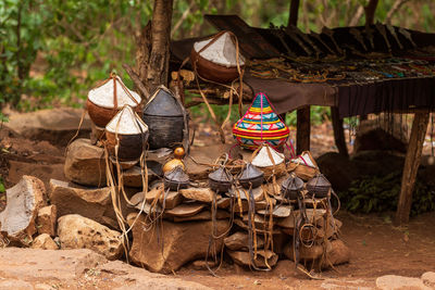 Clothes hanging on log in field