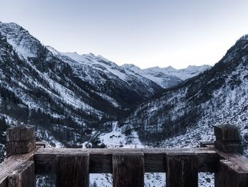 Scenic view of snowcapped mountains against clear sky