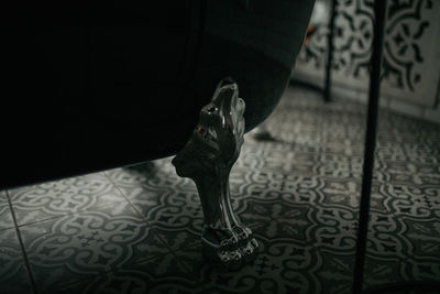 Luxury interior of big bathroom at modern african style with oval bathtub in natural lighting