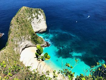 High angle view of rocks by sea