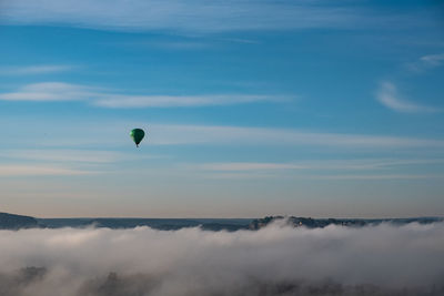 Hot air balloons flying in sky