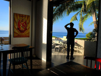 Rear view of man on beach