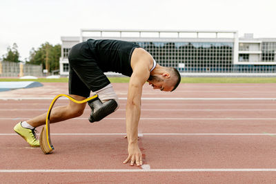 Rear view of man running