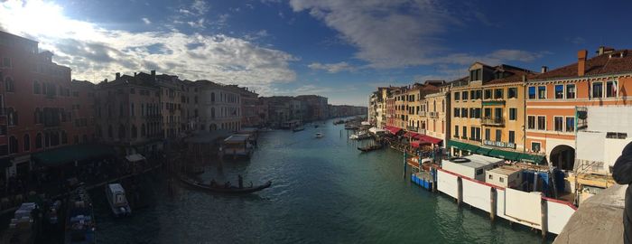 Panoramic view of canal passing through city