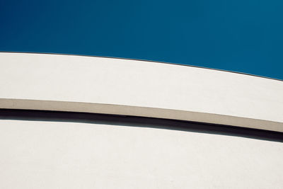 Low angle view of building against blue sky