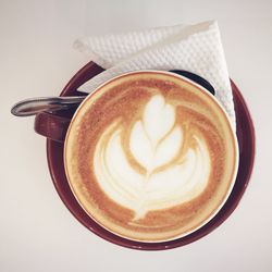 Directly above shot of cappuccino on table