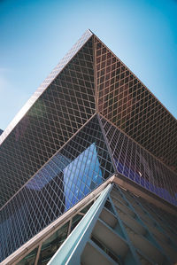 Low angle view of skyscraper against clear sky