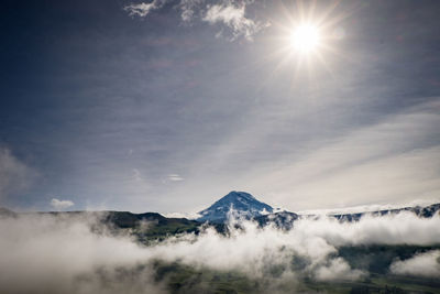 Scenic view of mountains against sky during winter