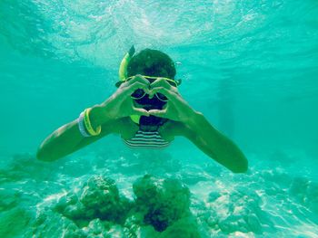 Man swimming in sea