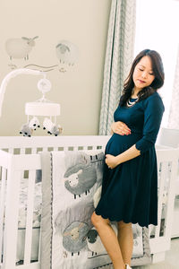 Portrait of smiling expected mother