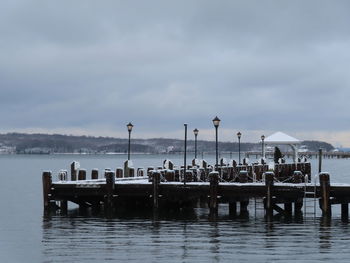 Pier on sea against sky