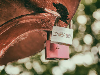 Close-up of padlocks hanging on heart shape
love lock sign - i love you -  ich liebe dich. 