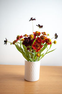 Flowers in vase on table