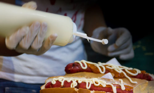 Close-up of hand holding ice cream