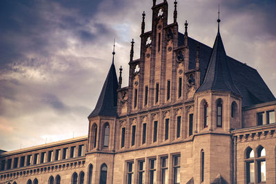 Low angle view of historic building against sky