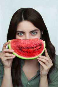 Portrait of woman holding watermelon summer