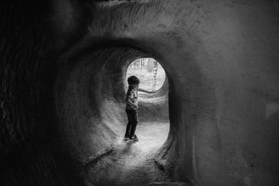 Full length of man standing in tunnel