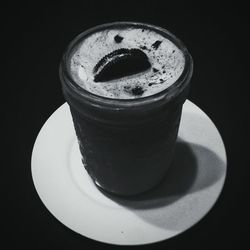 High angle view of drink in black background