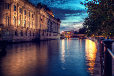 Reflection of illuminated buildings in water