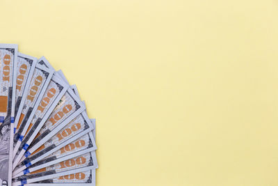 Close-up of yellow wall against gray background