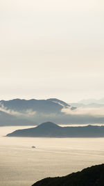 Scenic view of mountains against sky during sunset