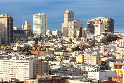 High angle view of buildings in city against sky