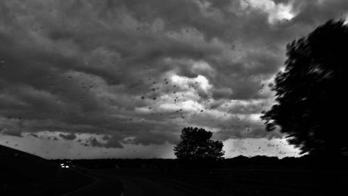 View of road against cloudy sky