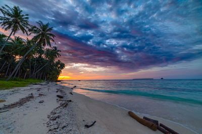 Scenic view of sea against sky at sunset