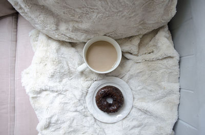 High angle view of coffee cup on table