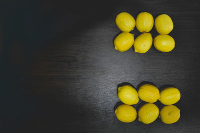 High angle view of yellow eggs on table