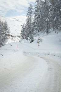 Wintertime snowy road - fex valley engadine swiss alps