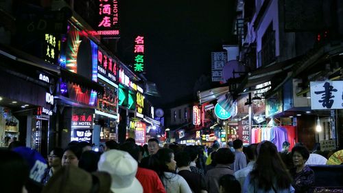 People in city at night