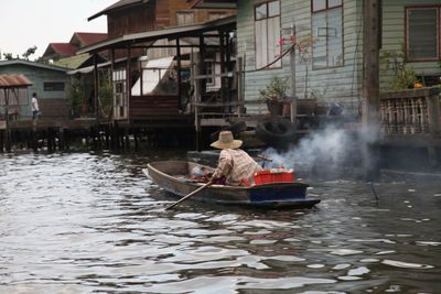 Man in boat at canal