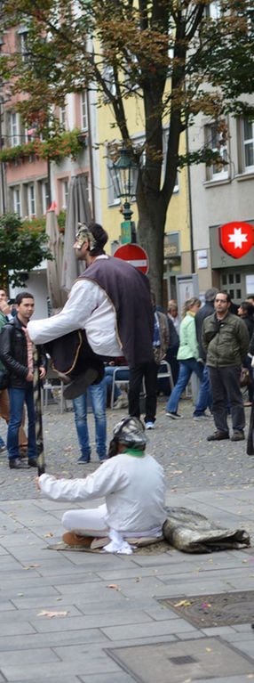 PEOPLE ON STREET IN CITY