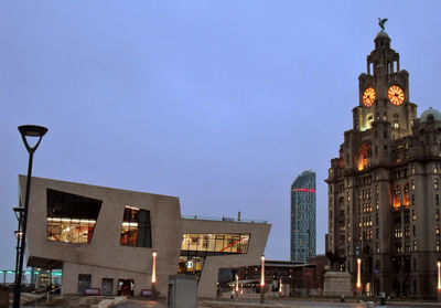 Low angle view of buildings against clear sky