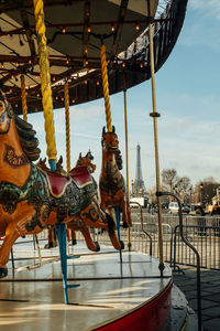 Carousel with eiffel tower in background