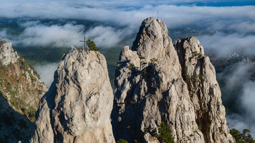 Panoramic view of rocks and mountains against sky