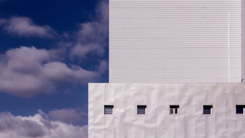 Low angle view of modern building against sky