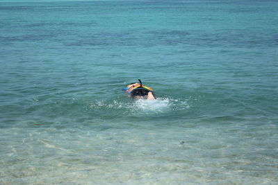 Man on boat in sea